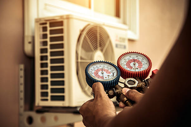 Professional Hvac technician working in Louisville, MS